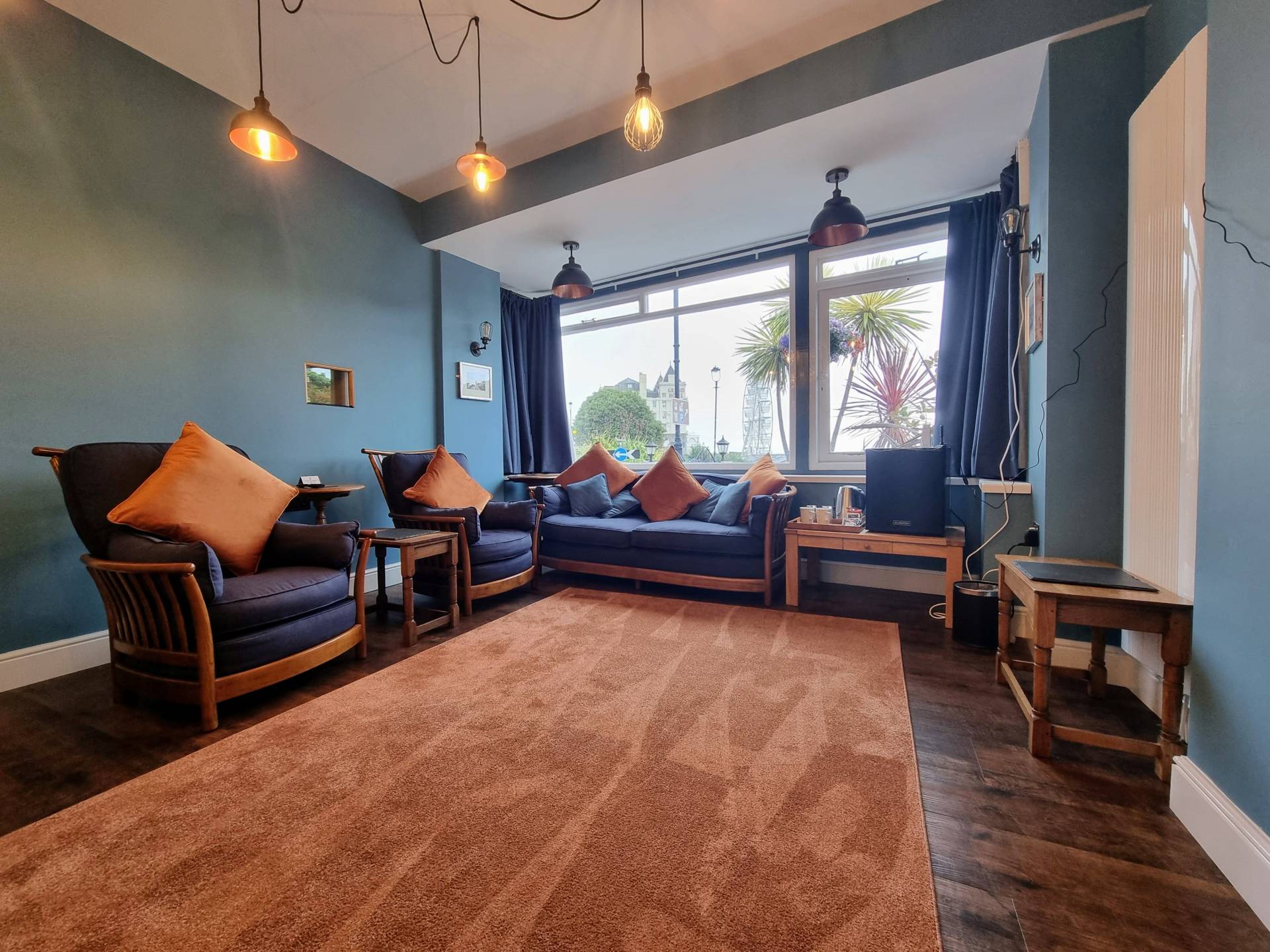 Lounge in Suite 101 overlooking the gardens, Wheel and Little Orme in Llandudno.