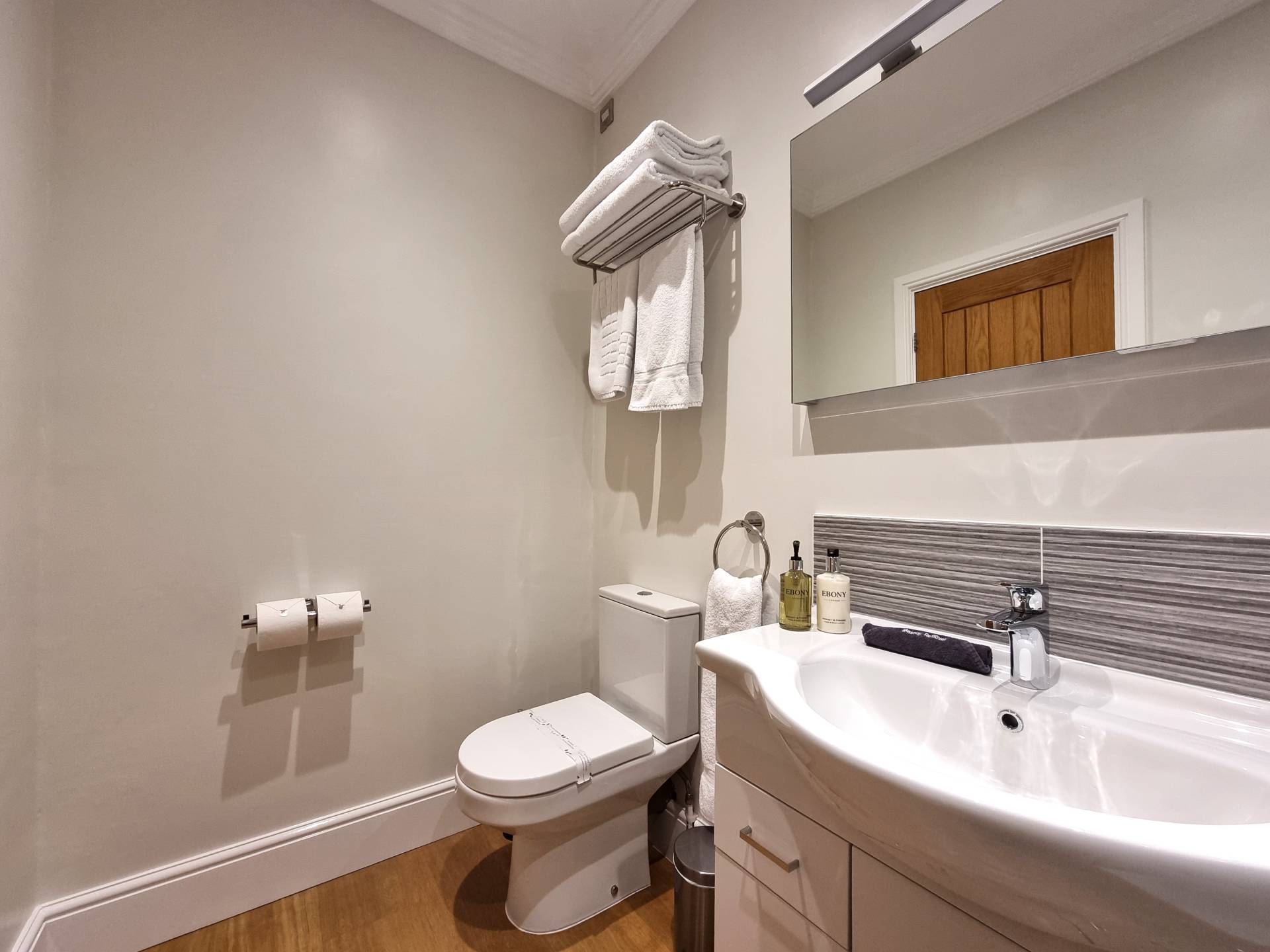Bright and stylish shower room in Room 302, Min y Don Llandudno – designed for comfort after a day by the sea.